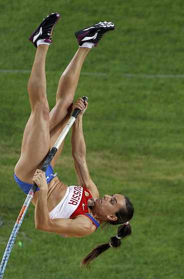 Yelena Isinbayeva competes in the women's pole vault final at the IAAF World Championships in Daegu