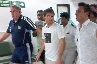 Lionel Messi arrives at the Kolkata international airport amid tight security