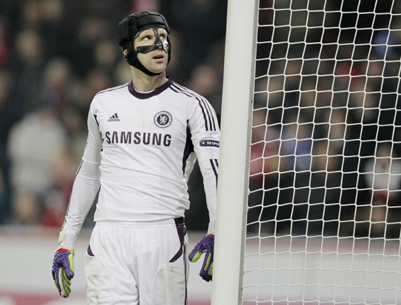 Chelsea goalkeeper Petr Cech reacts following his team's defeat against Bayer Leverkusen in the Champions League Group E  match in Leverkusen