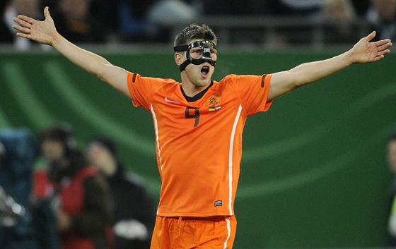 Forward Klaas-Jan Huntelaar of the Netherlands, wearing a protective mask, in the friendly match against Germany in Hamburg