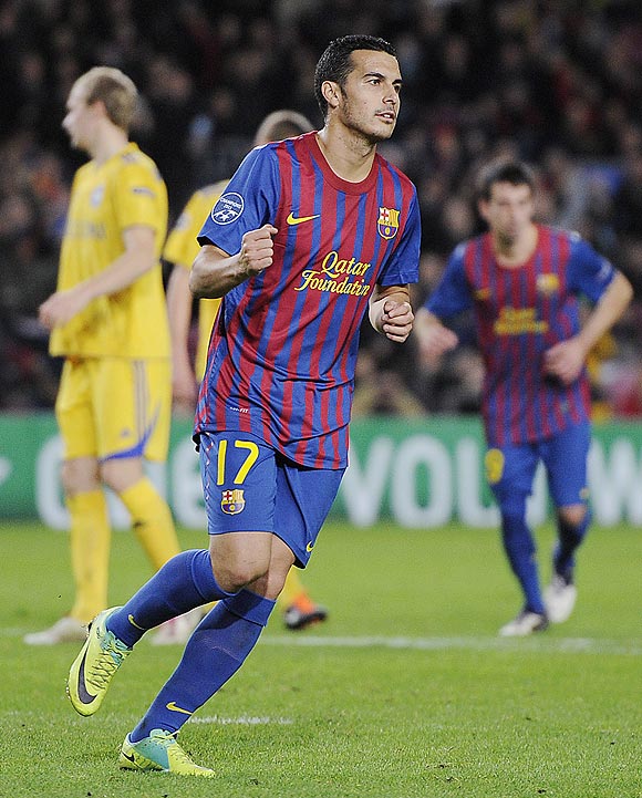 Barcelona's Pedro Rodriguez celebrates after scoring