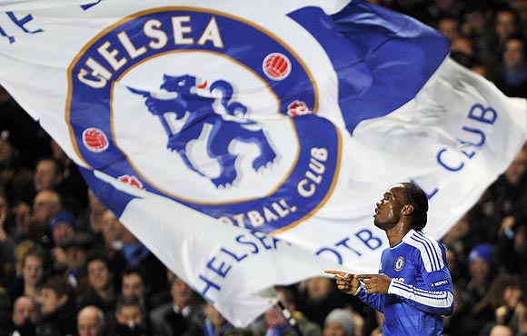 Chelsea's Didier Drogba celebrates after scoring his second goal against Valencia