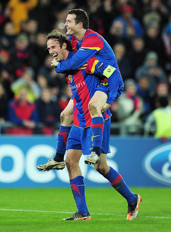 Fabian Frei and Marco Streller of Basel celebrate after beating Man U on Wednesday