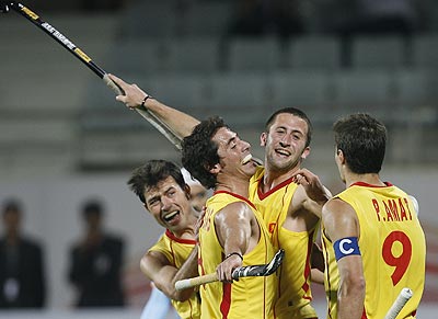Spain's Roc Oliva (second right) celebrates with team-mates