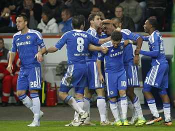 Chelsea team celebrates after scoring a goal