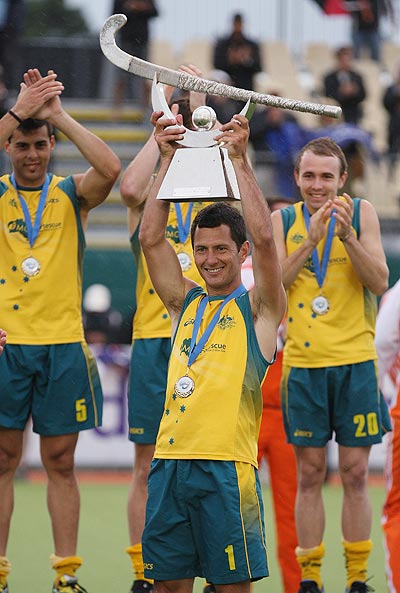 Jamie Dwyer of Australia holds up the trophy after winning the Champions Trophy