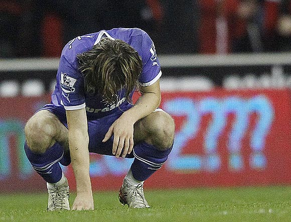 Tottenham Hotspur's Luka Modric is distraught after losing to Stoke City