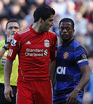 Luis Suarez and Patrice Evra in a confrontation