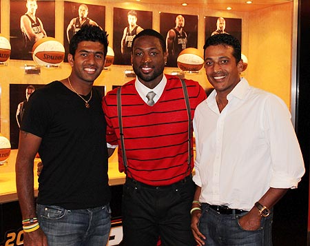 Rohan Bopanna (left) and Mahesh Bhupathi with NBA star Dwayne Wade