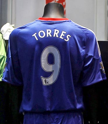 Chelsea soccer strip of the club's new signing, Fernando Torres, is displayed in the club shop at Stamford Bridge in London