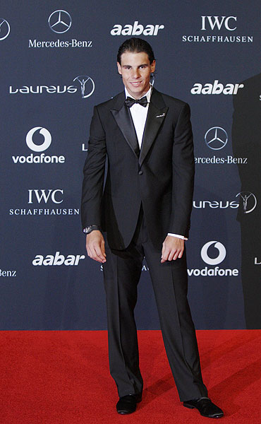 Rafael Nadal poses on the red carpet at the Laureus World Sports Awards in Abu Dhabi on Monday