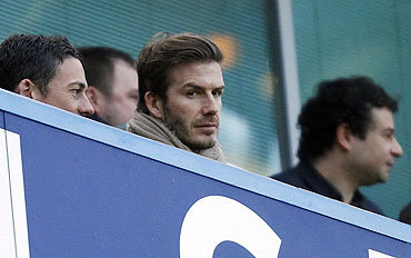 England's football star David Beckham (centre) was in attendance at the English Premier League match between Chelsea and Liverpool at Stamford Bridge on Sunday