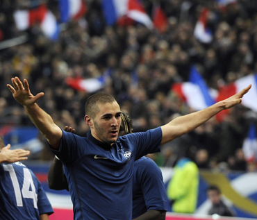 France's Karim Benzema reacts after scoring goal against Brazil