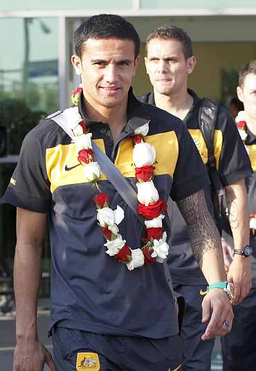 Australia's TIm Cahill arrive at the Doha International Airport