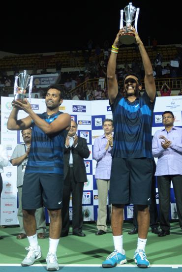Paes and Bhupathi with the Chennai Open trophy