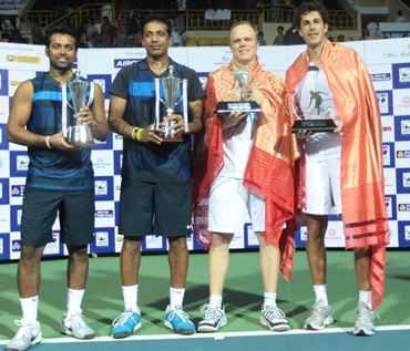 Leander Paes and Mahesh Bhupathi with the Chennai Open trophy