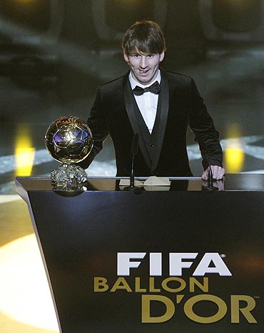Lionel Messi gives a speech after receiving his trophy