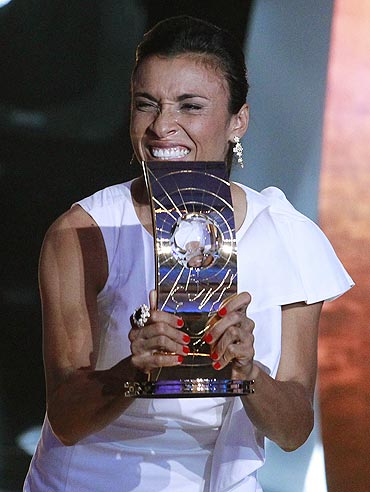 Marta of Brazil, FIFA Women's World Player 2010 holds the FIFA Ballon d'Or 2010 trophy