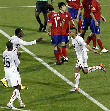 Bahrain's Faouzi Aaish celebrates after scoring his goal against South Korea