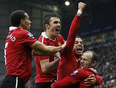 Man United's Javier Hernandez celebrates after scoring