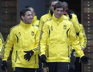 Liverpool's Fernando Torres and Maxi Rodriguez