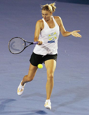 Maria Sharapova of Russia goes through the paces during a training session at Melbourne Park