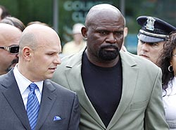 lawrence taylor outside the court