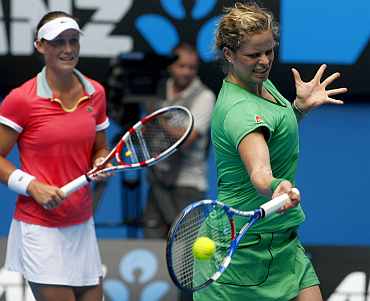 Kim Clijsters of Belgium hits a shot during a Rally for Relief match in Melbourne on Sunday