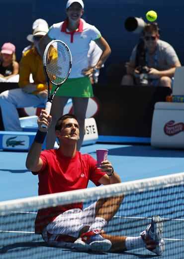 Novak Djokovic entertains the crowd in Melbourne
