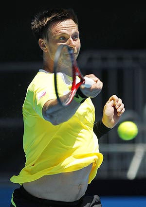 Robin Soderling of Sweden in action against Jan Hernych of the Czech Republic on Saturday