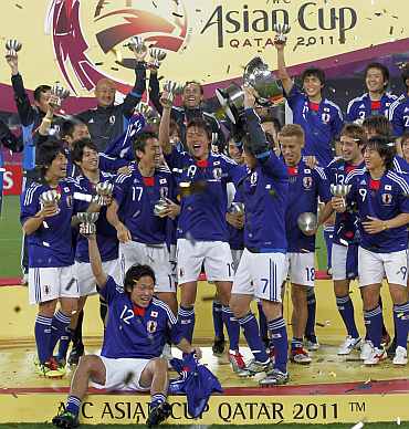 Japan players celebrate after winning the AFC Asian Cup