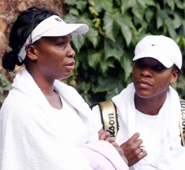 Serena Williams (right) with sister Venus