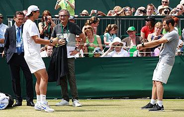 Rafael Nadal (left) at a training session on Saturday