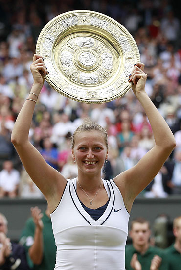 Petra Kvitova of the Czech Republic with the winners' trophy