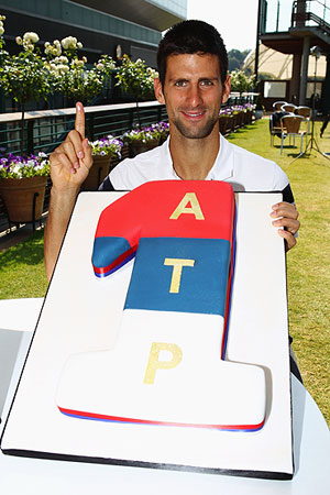 Novak Djokovic celebrates his No 1 ranking