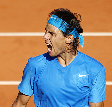 Rafael Nadal reacts during his quarter-final match against Robin Soderling