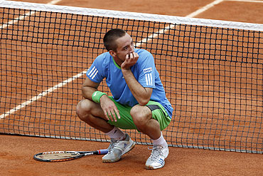 Viktor Troicki reacts during his match against Andy Murray