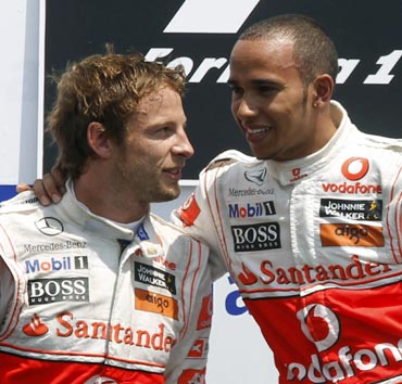 Lewis Hamilton (left) with team-mate Jenson Button