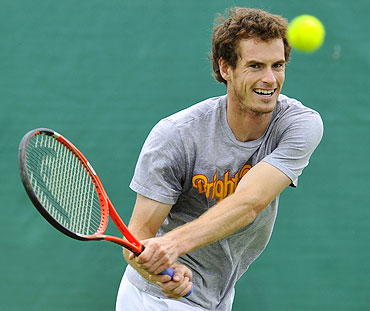 Andy Murray returns the ball during a training session on Sunday