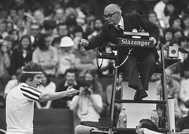 John McEnroe argues with the umpire