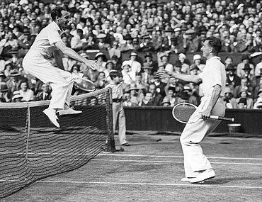 Fred Perry celebrates after winning the Wimbledon Championships in 1935