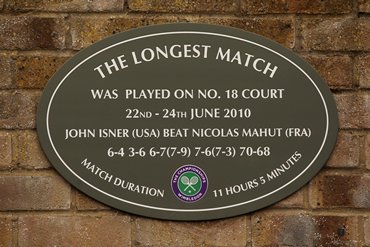 The plaque outside court 18 stating 'The Longest Match' , between  John Isner and Nicolas Mahut during Wimbledon 2010