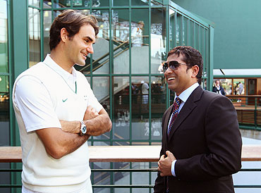 Roger Federer chats with Sachin Tendulkar on Saturday