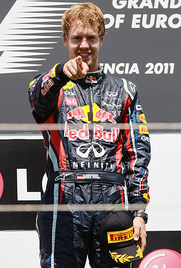 Sebastian Vettel celebrates after winning the European Formula One Grand Prix