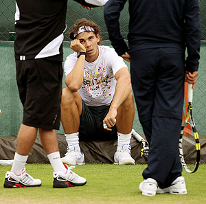 Rafael Nadal takes a break during practice on Tuesday