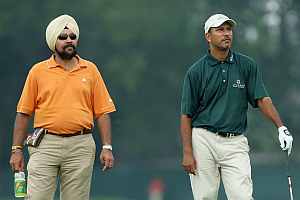 Jeev (right) and coach Amritinder Singh