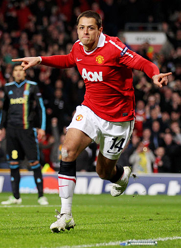 Javier Hernandez of Manchester United celebrates scoring the opening goal