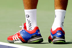 Tribute to Japan writen on Novak Djokovic's socks