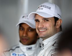 Hispania Racing drivers Vitantonio Liuzzi of Italy (R) and Narain Karthikeyan of India (L)