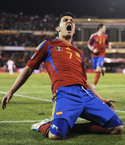 David Villa celebrates after scoring his second goal